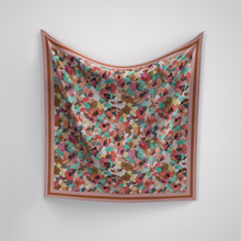 Load image into Gallery viewer, Floral patterned scarf on a white background
