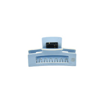 Load image into Gallery viewer, A blue  colored claw clip hair accessory on a white background.
