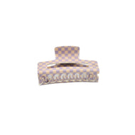 A checkered claw hair clip in lilac and beige colors.