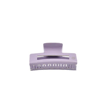 Load image into Gallery viewer, A lilac colored claw clip hair accessory on a white background.
