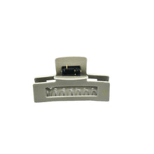 Load image into Gallery viewer, A sage green colored claw clip hair accessory on a white background.
