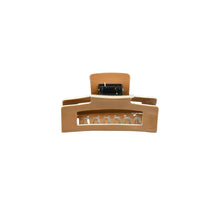 Load image into Gallery viewer, A tan and white claw hair clip with a strong grip mechanism, displayed on a white background.
