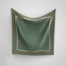 Load image into Gallery viewer, A soft green silk scarf with hand rolled edges and a tan and cream border, displayed on a white background.
