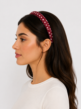 Load image into Gallery viewer, Woman wearing a red polka dot headband on a white background
