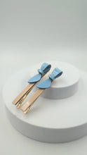 Load and play video in Gallery viewer, Cassandra Two Tone Beige and Blue Bow Clips
