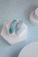 Load image into Gallery viewer, Light blue watercolour resin alligator clips
